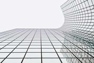 Glass building low Angle shots during the day

